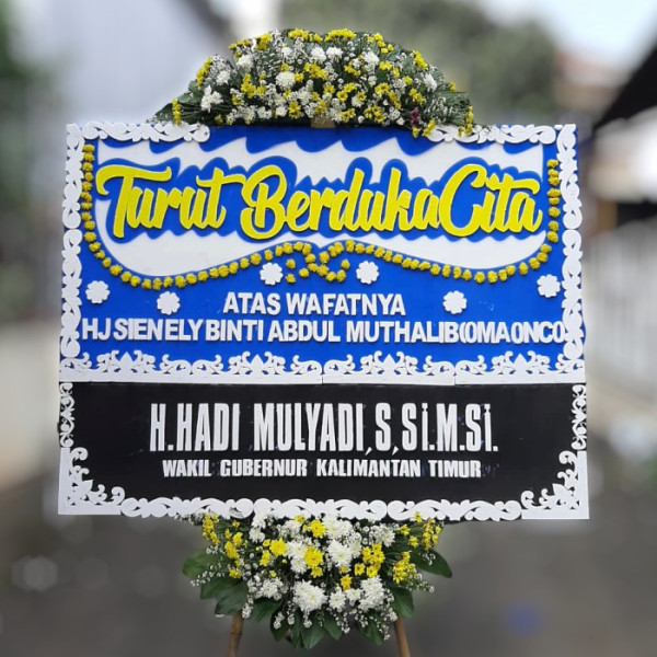 Karangan Bunga Duka  di Tanjung